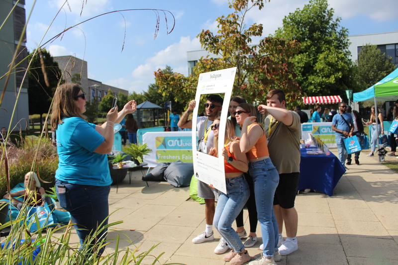 Students posing at the Welcome Fair