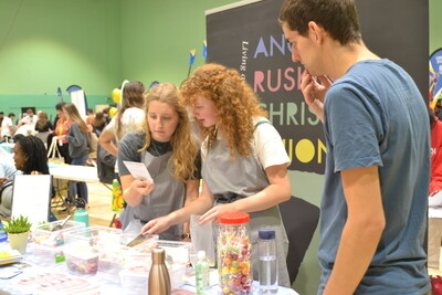 Students on a stall at Cambridge Freshers Fair