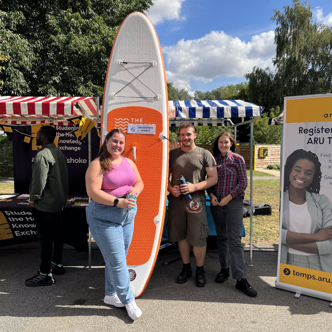 Watersports society with a paddleboard
